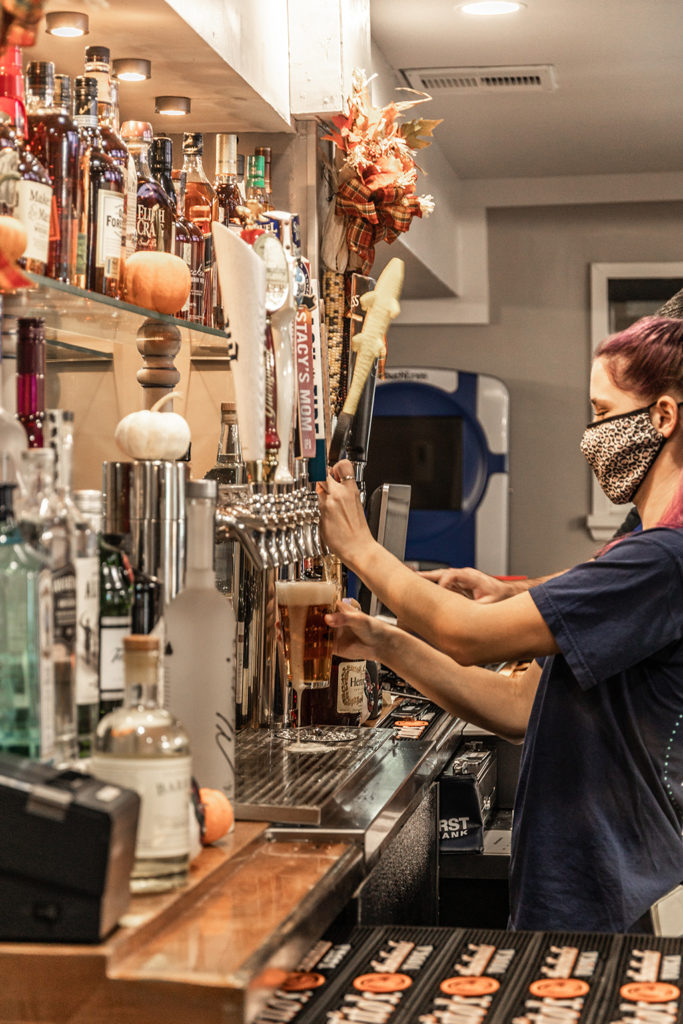 The Bartender pouring a beer in Freddy J's Bar & Kitchen in Mays Landing, NJ