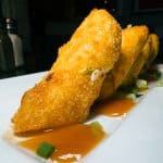 Crab Rangoon Egg Rolls - Cream cheese + scallions + crab meat + sweet & sour sauce