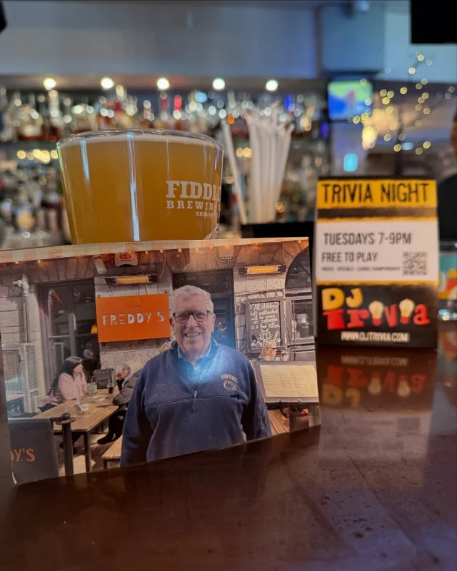 It is with profound sorrow that we announce the sudden passing of our dear friend and regular, Paul, affectionately known here as Chef.

Paul first joined us on a date night with his beloved wife. He used to say she insisted she hated hamburgers, yet she could not resist ours. When illness kept her at home, Paul would pick up burgers for them both, calling it “my cooking.” In those moments, he made our kitchen feel like his own and earned his nickname.

Paul never held back his suggestions, good or bad, because he wanted this place to succeed. We cherished his honest feedback. After his wife passed away, Paul continued to come back, bringing friends, family, and his over-55 trivia team. On many of those visits, he would bring his faithful dog, whose gentle presence offered comfort to him and a smile to everyone who met her. On Tuesday nights their laughter and fierce competition filled our dining room and lifted our spirits.

Every Tuesday Paul would check in with @_maggiechfig92 about her favorite IPA so he could surprise her with something new. We looked forward to that simple ritual almost as much as we looked forward to seeing him.

Tonight we will pour a fresh IPA in his honor. The photo he gave us from his last trip to Ireland has hung in our office since the moment he handed it over. That photo will sit beside the beer as a reminder of Paul’s joy, his generosity, and the excitement he felt discovering a Freddy’s bar on both sides of the pond.

We are crushed that we will no longer hear his footsteps on Tuesday nights or see his bright smile. Our hearts ache with his absence, yet we take comfort knowing he has been reunited with the wife he loved so dearly.