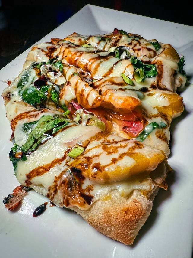 🍑 NOT YOUR AVERAGE PEACH FLATBREAD 🍑

The Jersey Peach Flatbread is one of the boldest additions to our new menu; sweet, savory, and packed with flavor that hits from every angle.

It starts with peach pepper jam and caramelized onions, then we layer on pickled red onions, baby spinach, gorgonzola, and fresh peaches. A balsamic reduction ties it all together in a way that’s completely unexpected and seriously satisfying.