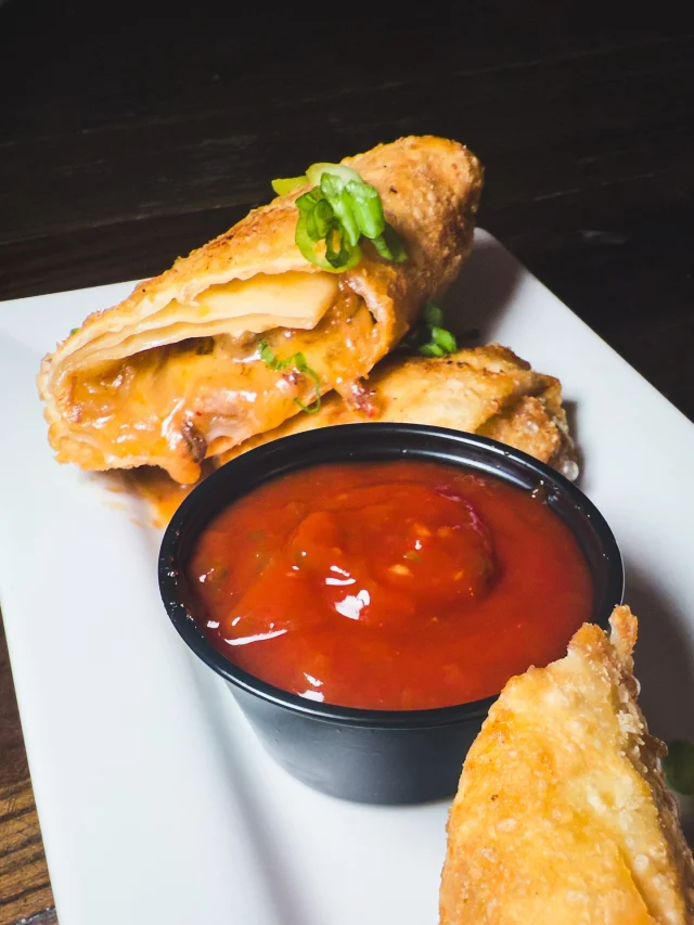 We weren’t about to serve the same old cheesesteak egg rolls with that basic sriracha ketchup.

These are loaded with our house-smoked brisket, melty @coopercheese American cheese sauce, and sweet caramelized onions, all wrapped and fried until golden and shatter-crisp.

And the sauce? Cherry pepper ketchup. Bright, bold, and just the right kick.

They don’t start meals. They steal the spotlight.